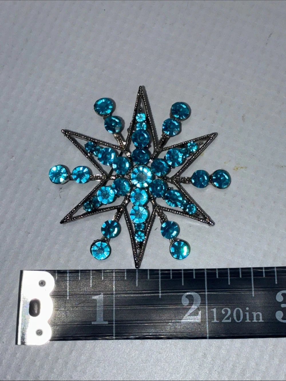 Turquoise/Blue Starburst Snowflake Brooch - silvertone